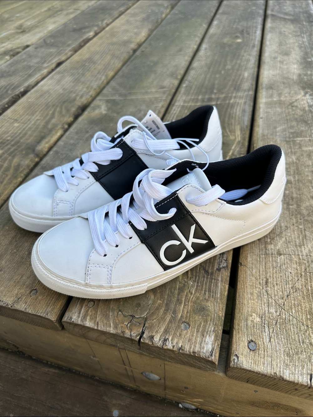 Calvin Klein Kids White Sneakers with Black CK Side Panel